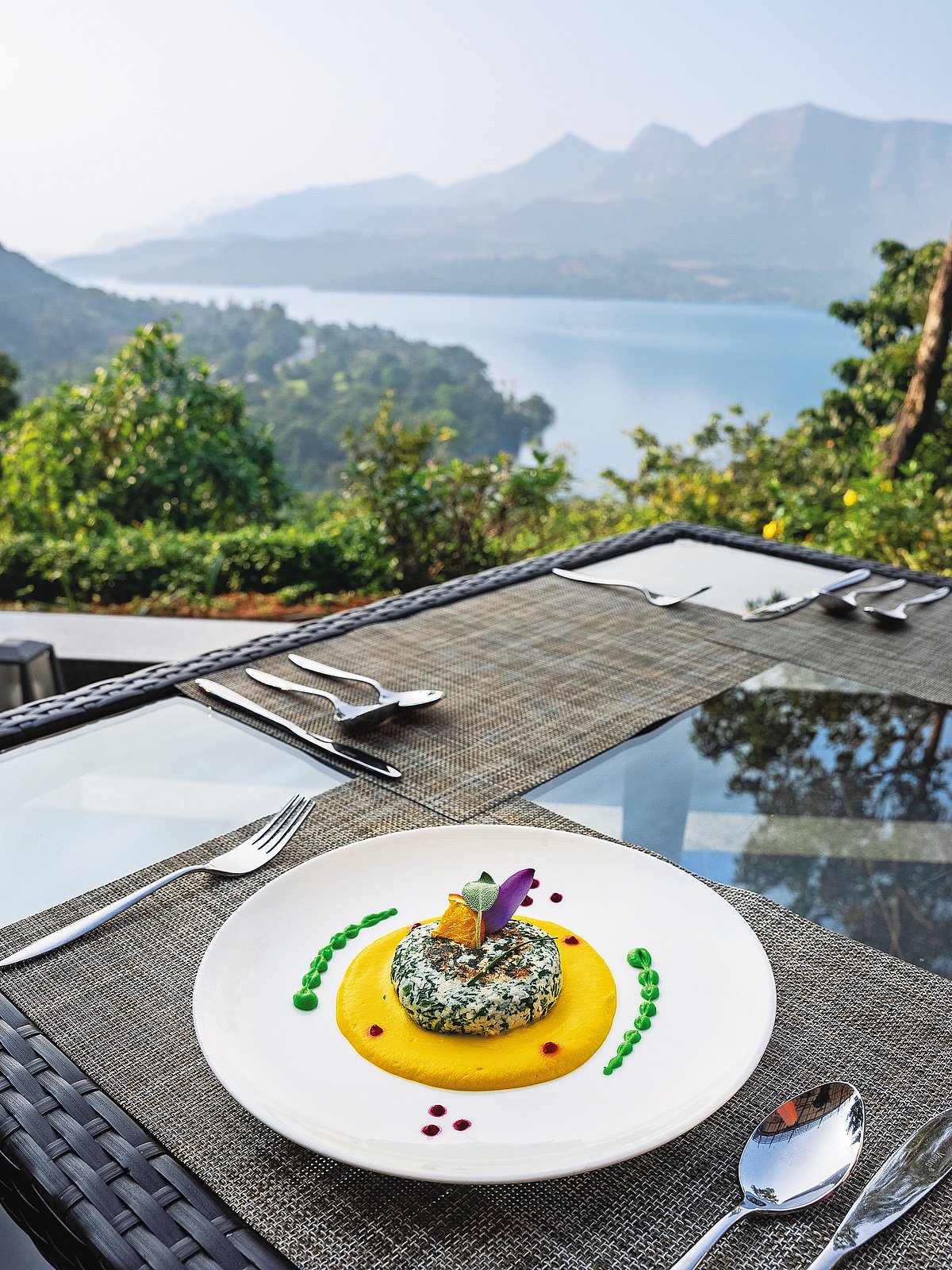 Outdoor dining with stunning views of Mulshi Lake and the Sahyadri mountains