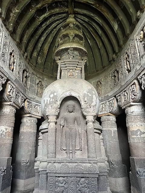 Cave 19 in Ajanta has an ornate carving of the Buddha on the stupa