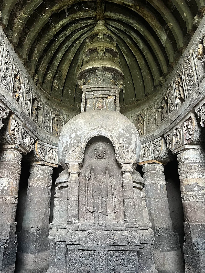 Cave 19 in Ajanta has an ornate carving of the Buddha on the stupa