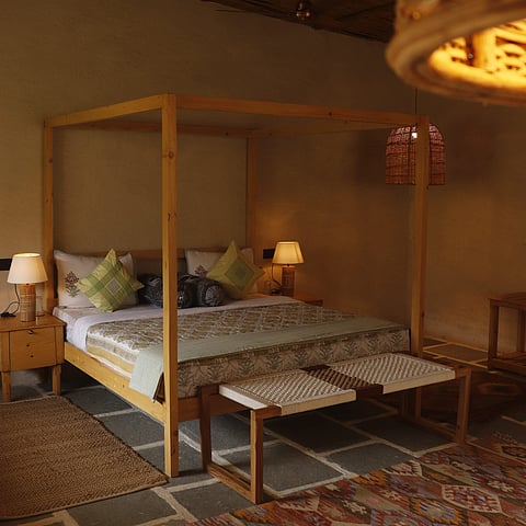 A farmhouse room in Dhyaana Farms