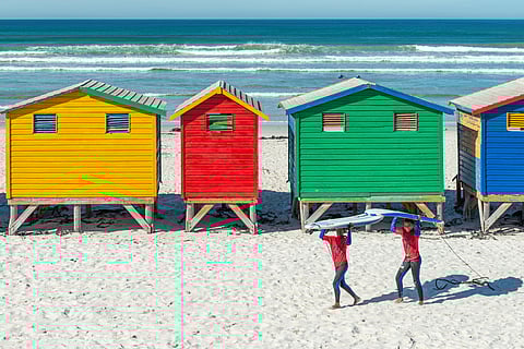 Muizenberg in Cape Town is ideal for beginners with its gentle, consistent waves