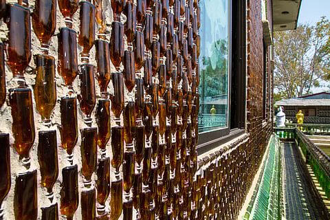 The idea for the Wat Pa Maha Chedi Kaew came about after Buddhist monks sought to use discarded beer bottles in an environmentally friendly way