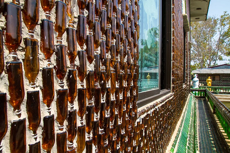 The idea for the Wat Pa Maha Chedi Kaew came about after Buddhist monks sought to use discarded beer bottles in an environmentally friendly way