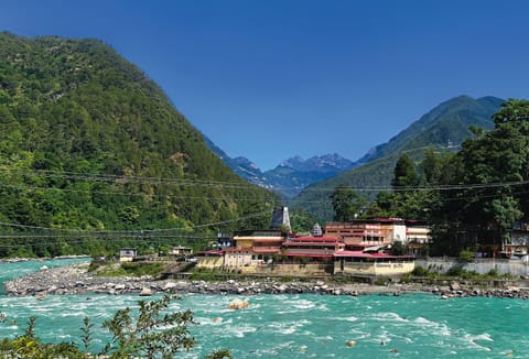 Sivananda Kutir offers a serene riverside retreat for meditation and spiritual learning