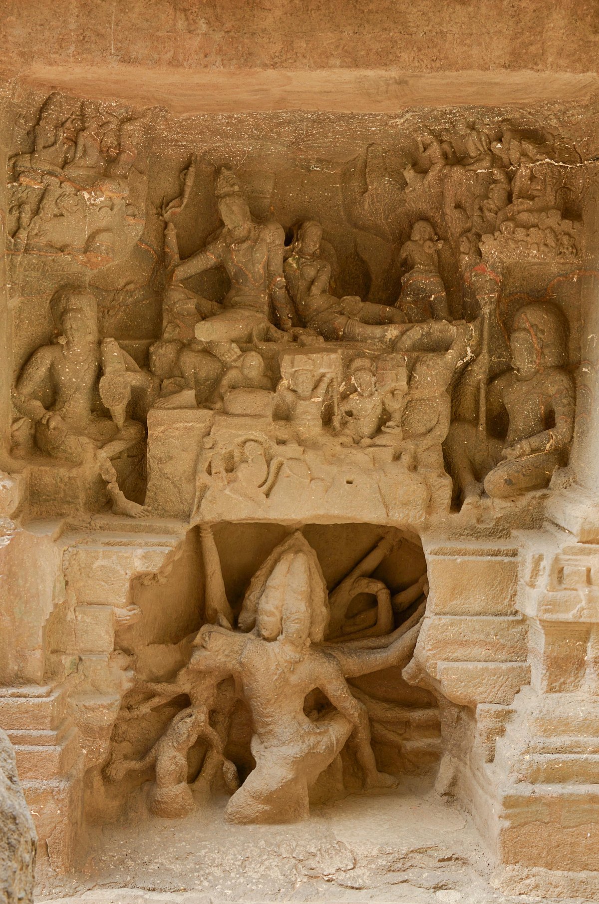 A depiction of Ravana (bottom) shaking Mount Kailasha in the Ellora Caves