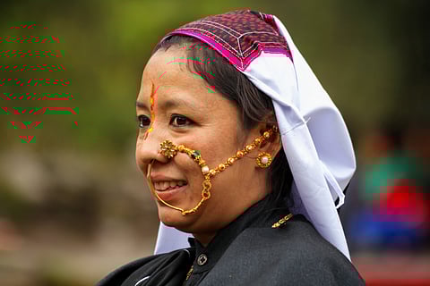 A Munsiyari resident in traditional garb