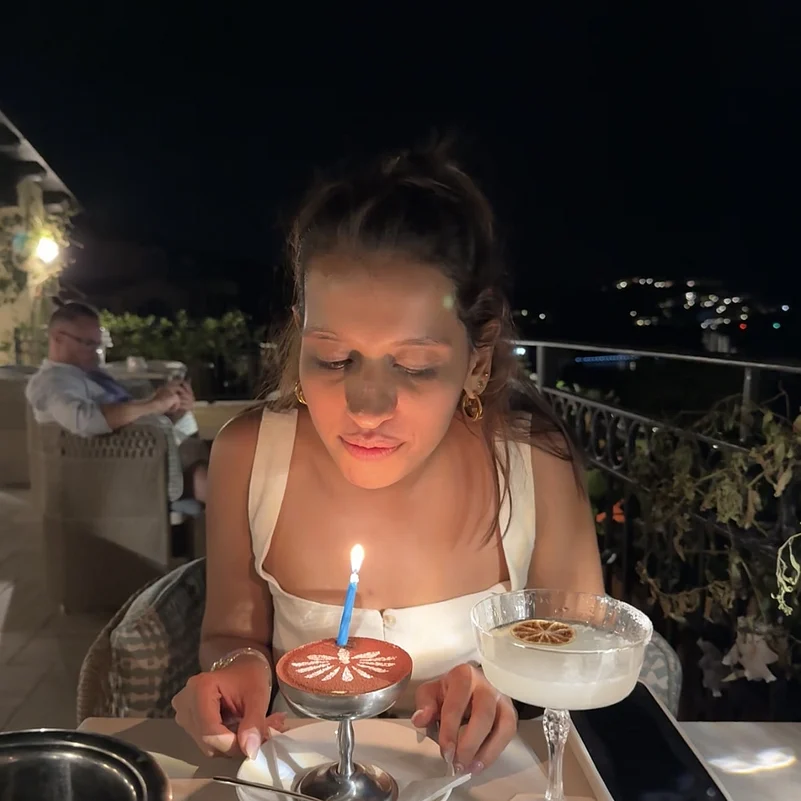 The author celebrating her 31st birthday in Sardinia