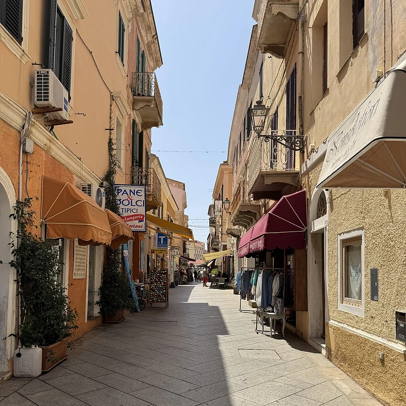 The butter-yellow facades and curio boutiques of La Maddalena