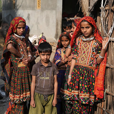 Dhaneta Jat children pose for a photo