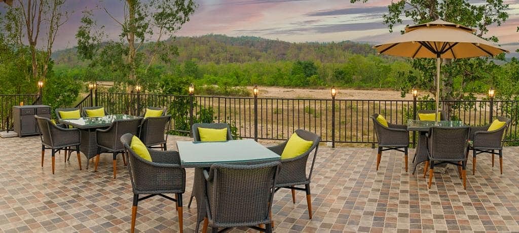 The Jungle Grill restaurant at The Golden Tusk in Uttarakhand offers a fusion of jungle-inspired cuisines from around the world