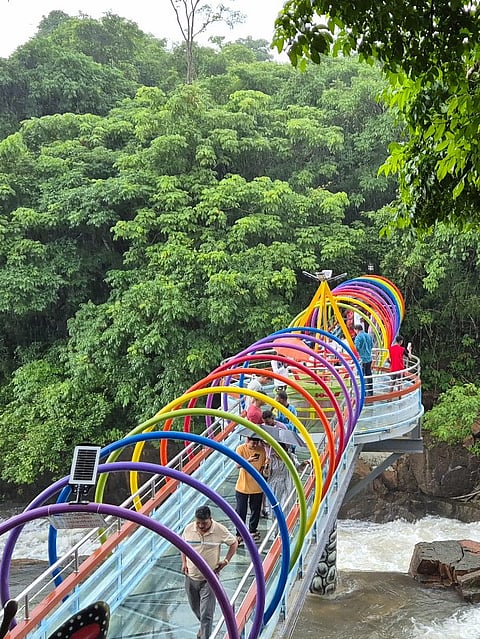 Tourists at the Napne Waterfall Glass Skywalk