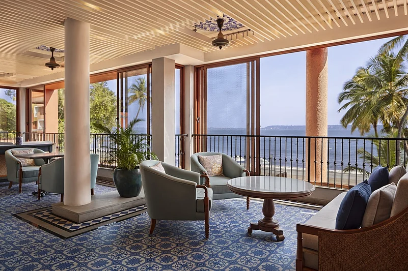 Azulejos-inspired blue tiles and patterns on the floor of this space in the Taj Cidade de Goa Heritage