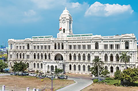 Ripon Building, a stately Neoclassical structure crowned with a 132-foot clock tower
