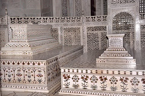 The replica tombs of Shah Jahan (left) and Mumtaz Mahal (right) in the main mausoleum of the Taj Mahal