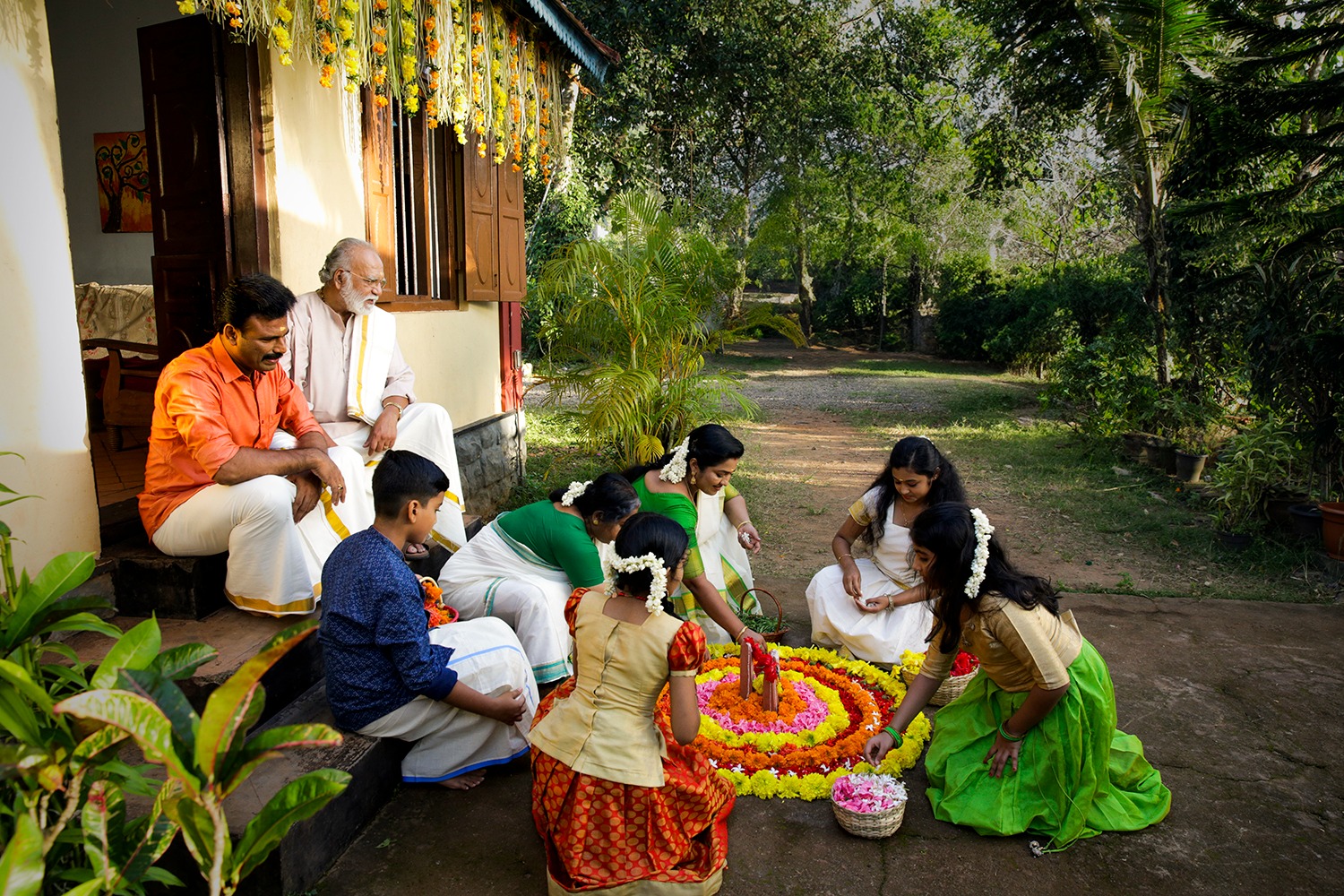 The Pookalam is a roundish flower-carpet, typically arranged by the children and women on the front yard of their house. Laid soon after the break of day, the Pookalam is centered by the cube-shaped clay idols called Thrikkakarayappan.