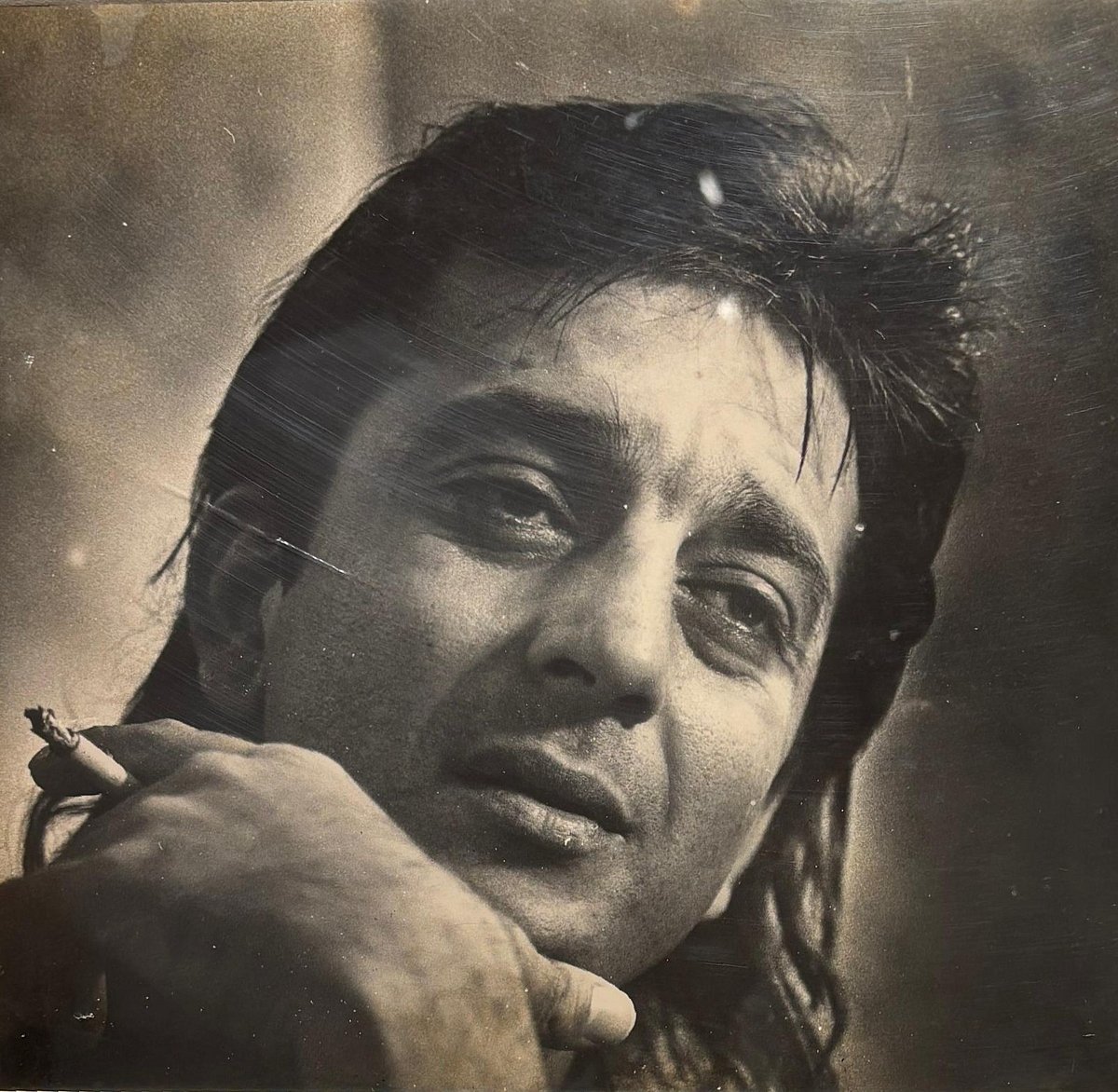 A shot of Sanjay Dutt smoking a cigarette by Pradeep Chandra