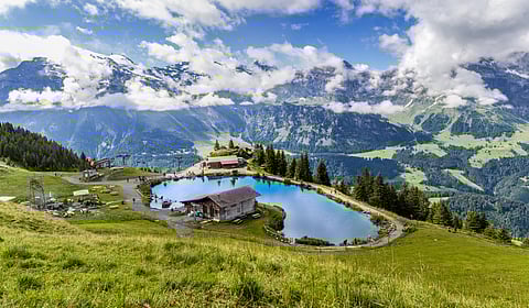 The mountain lake of Härzlisee is located above Engelberg in the Brunni area in the canton of Obwalden