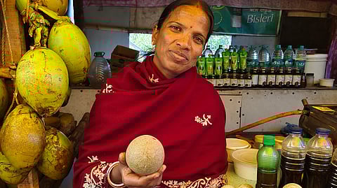 Manu Baidya, a local vendor, selling wood apples at Jharkhali in the Sundarbans