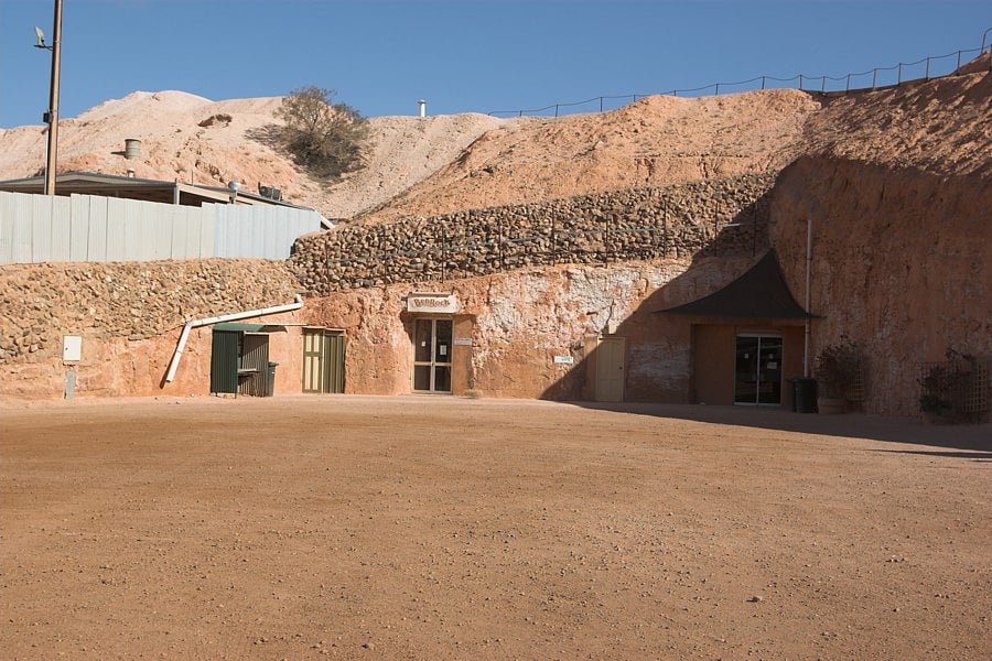 The subterranean life extends beyond housing: shops, churches, campsites, and hotels all exist beneath the earth