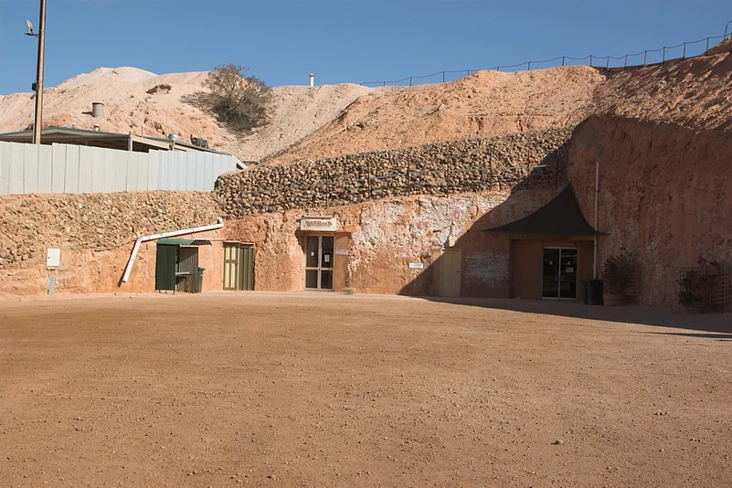 The subterranean life extends beyond housing: shops, churches, campsites, and hotels all exist beneath the earth