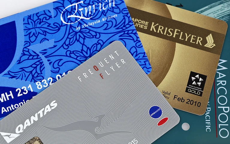 Airline rewards programs are meant to encourage passengers to accumulate “points” with a specific airline which can then be redeemed for upgrades and rewards - ribeiroantonio/Shutterstock