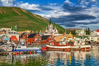 jlrphoto/Shutterstock : The town of Húsavík on the northeast coast of Iceland