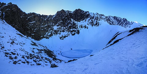 The Roopkund amidst the snowy mountains