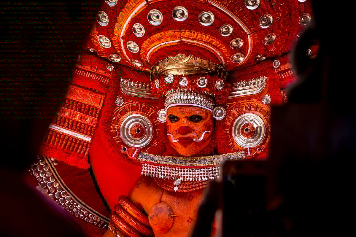 Many temples in Kerala host annual Theyyam festivals