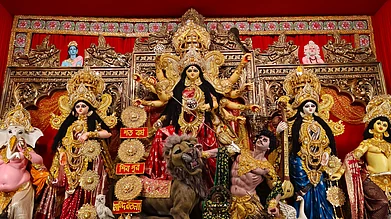 Anwesha Santra : Close-up of Durga idol with Goddess Durga, Mahishasura, and her children, symbolising victory of good over evil at Kolkata Durga Puja