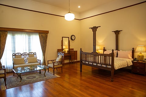 Elegant colonial-style room at Marli Hill Bungalow, Ooty, blending antique charm with modern comfort