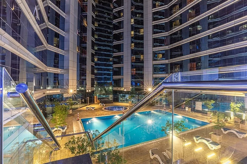 Guests can enjoy amenities such as a wellness spa, fitness centre, and swimming pools