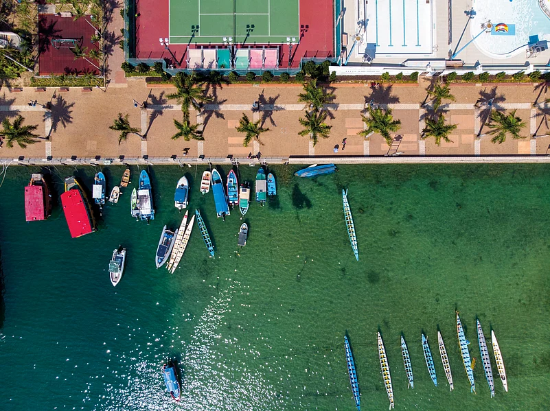 Glide across the turquoise waters of Sai Kung’s UNESCO Global Geopark, where volcanic cliffs and quiet islands reveal Hong Kong’s untamed natural side.