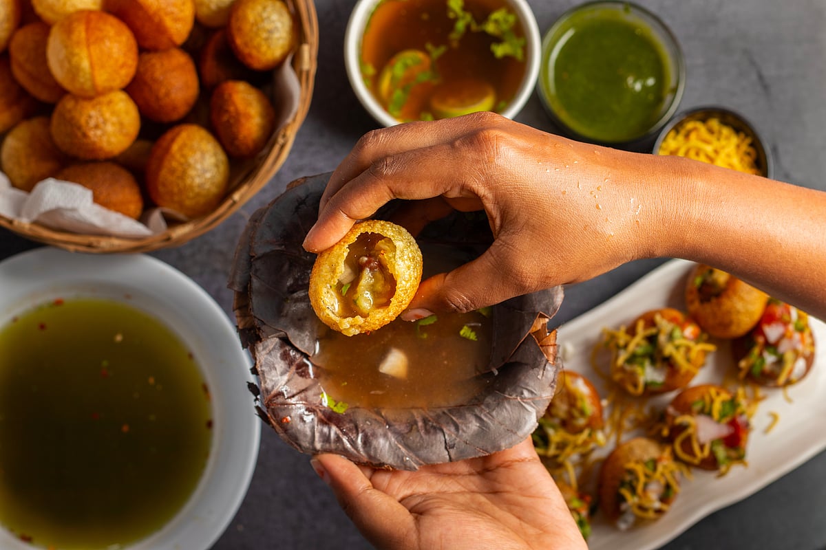 Street food delights at CR Park—from puchkas to mishti, every bite is a taste of Bengal.