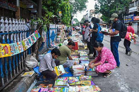 College Street, Kolkata’s iconic book hub, buzzes with readers and Puja shoppers hunting rare titles and festive reads