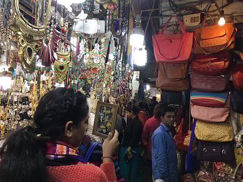 Hatibagan’s traditional saree shops and festive displays attract last-minute Puja buyers from across the city