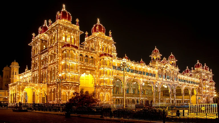 100,000 lights illuminate the Mysore Palace buildings over a ten day period each year during Mysuru Dasara - Shutterstock