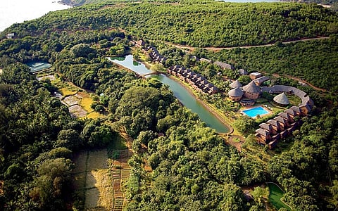 Set above Om Beach in Gokarna, SwaSwara blends Ayurveda, yoga, and organic living with pet-friendly policies for a mindful coastal escape.