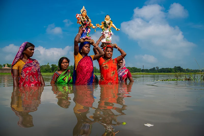 On the final night, Bhadu Bisarjan (the immersion) villagers carry Bhadu’s clay idol to the river or pond, they sing Bhadu gaan one last time