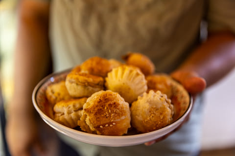 A plate of flaky Goan pastries