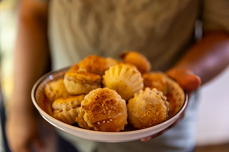 A plate of flaky Goan pastries