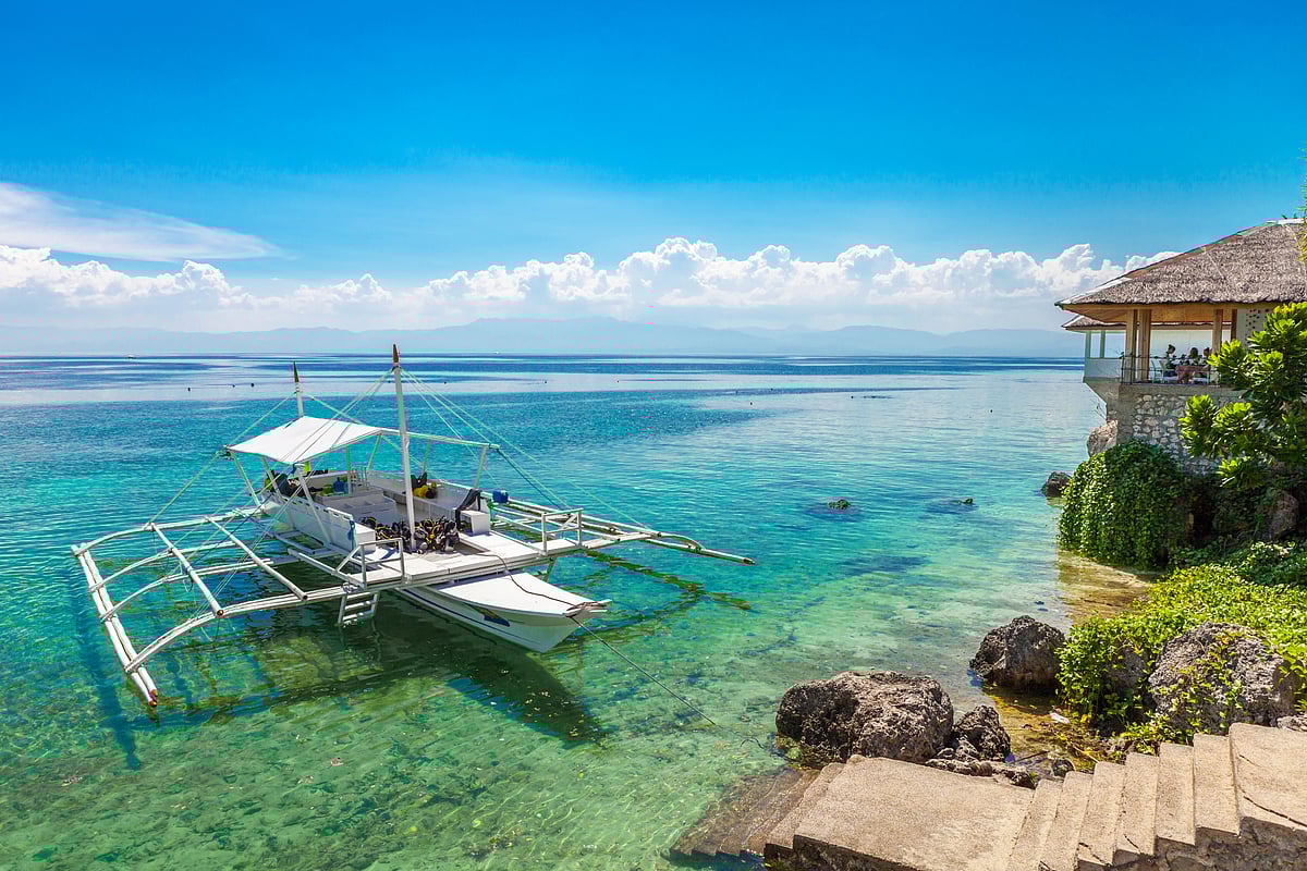 Boat equipped with scuba diving gear ready for an underwater adventure in the Philippines