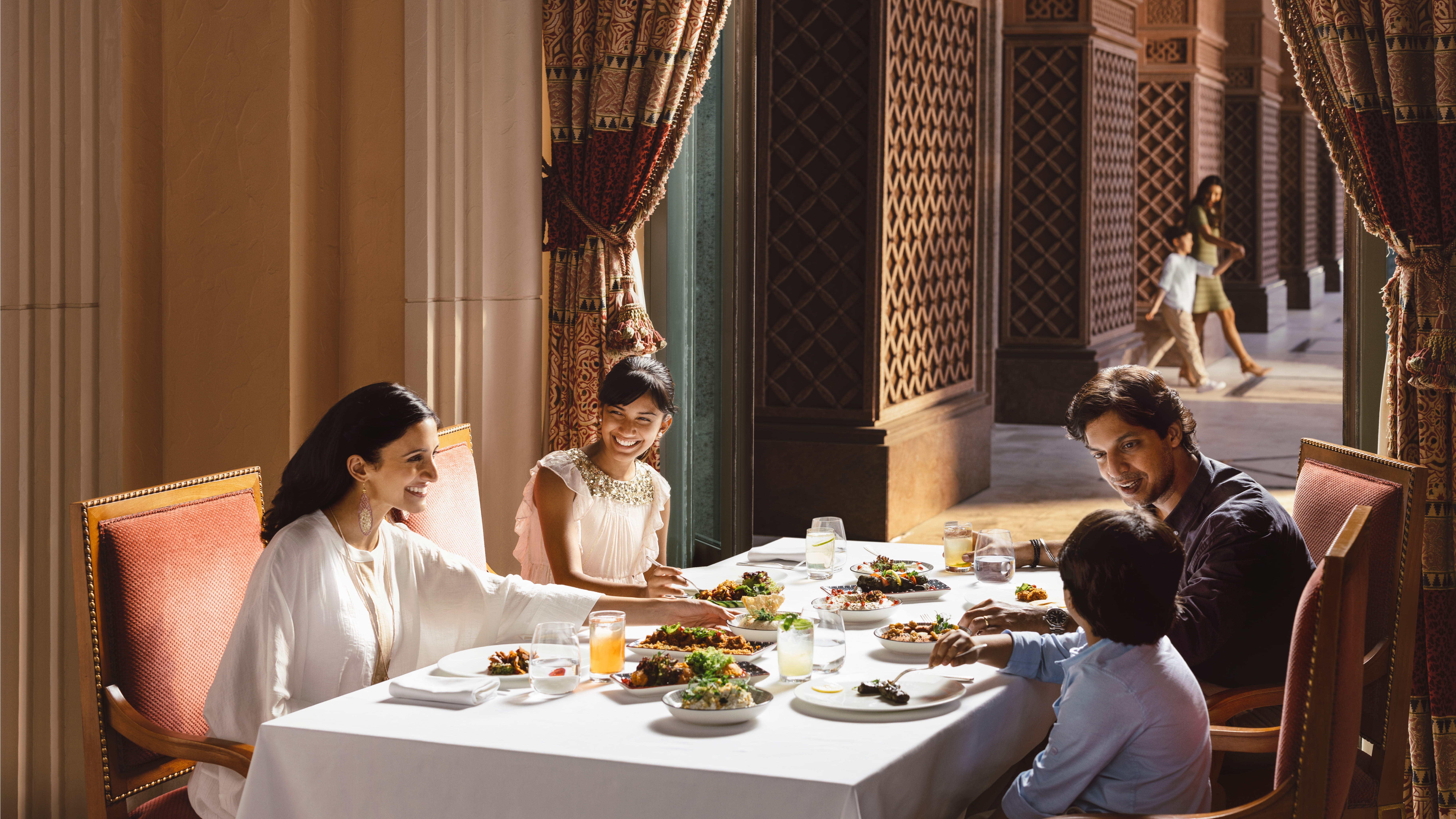 A family enjoys a meal in Abu Dhabi