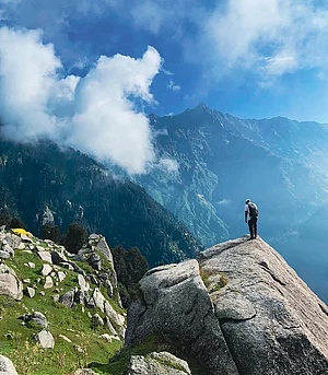 dhauladharwasi/instagram : A trekker along Triund Trek