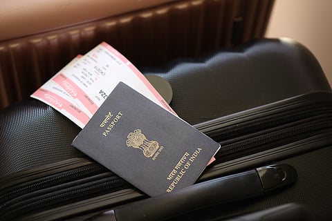 Indian passport with boarding pass