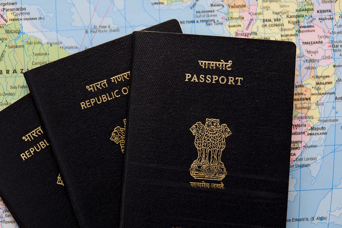 Shutterstock : Indian passports on a world map
