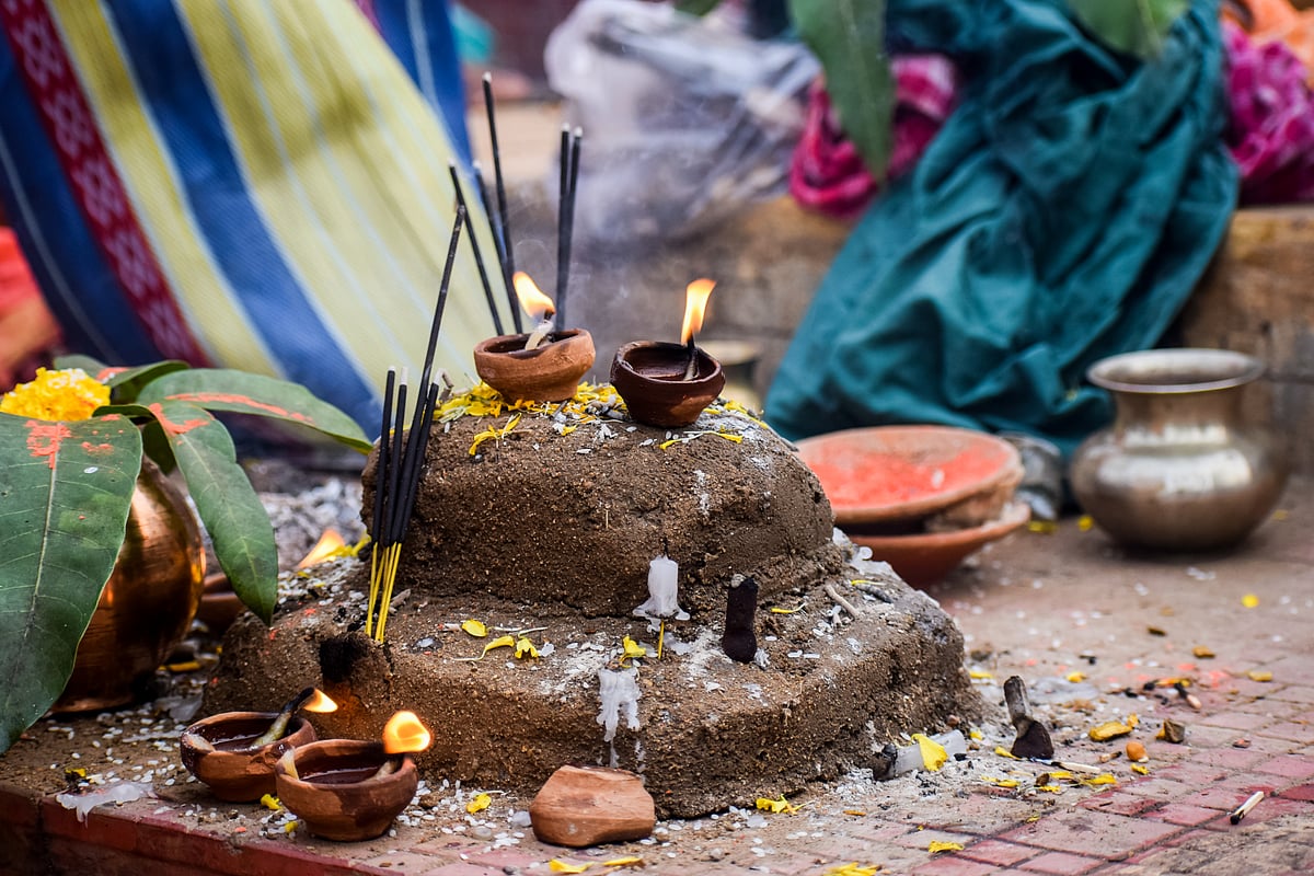 Chhath Puja celebrations at a riverside temple