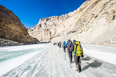 Shutterstock : Trekking across the frozen Zanskar River during winter