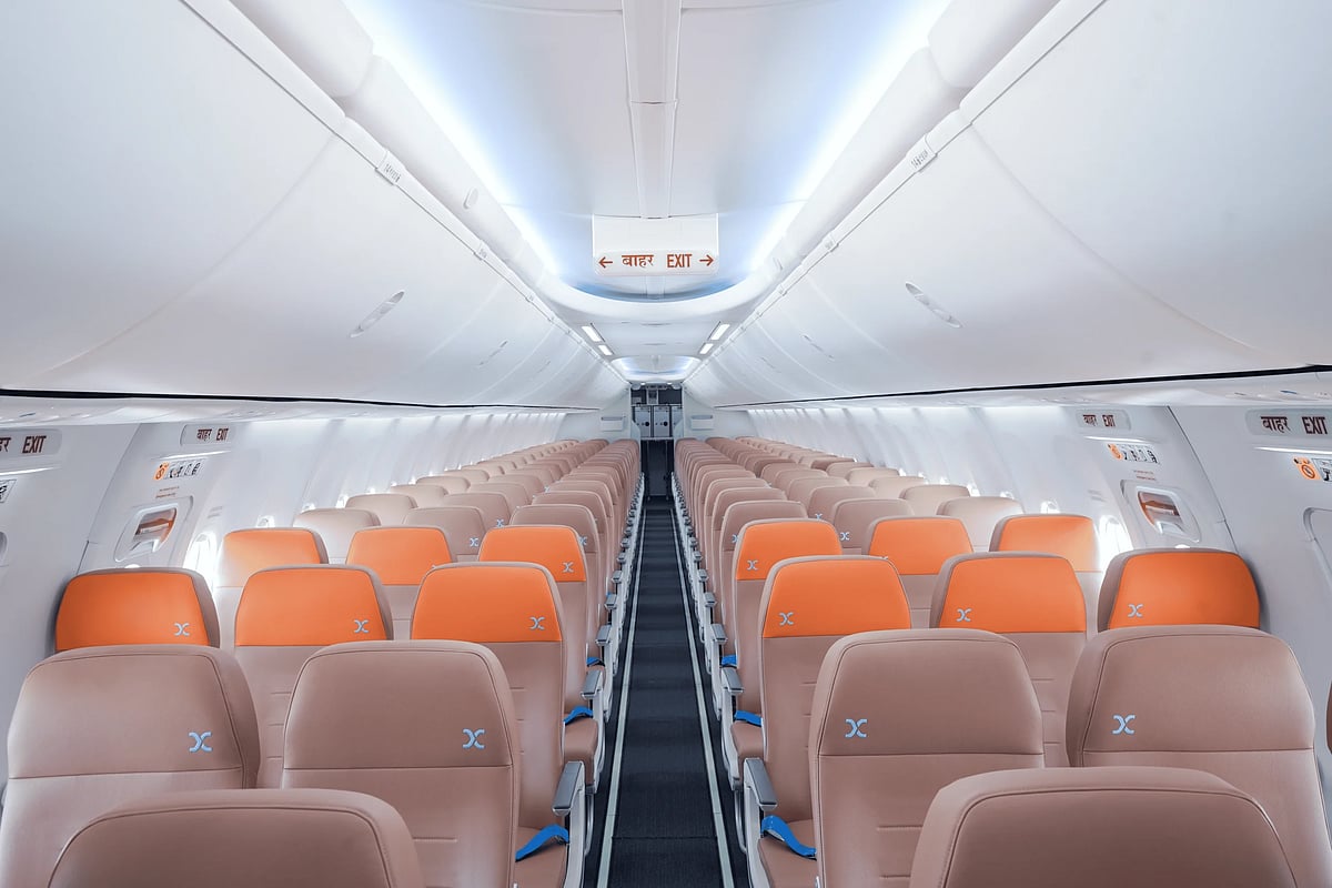 The refreshed cabin features ergonomically designed leatherette seats, mood lighting, and in-seat USB-C charging for a more comfortable flying experience.