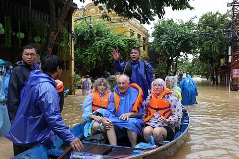 Flooded streets in central Vietnam following days of heavy rainfall, with water levels disrupting daily life and local transport networks.