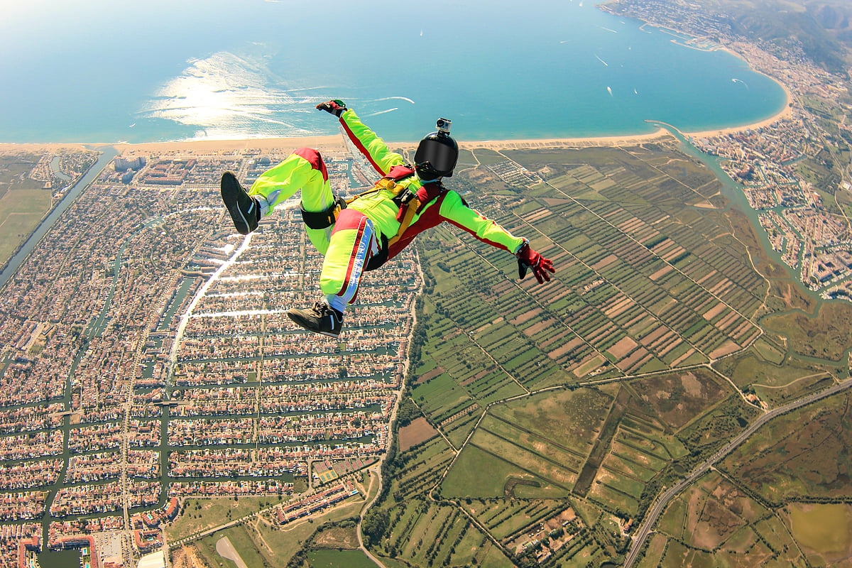 A skydiver soars over Dubai, capturing the thrill of adventure